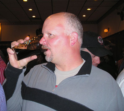 Fuzz enjoying a beer