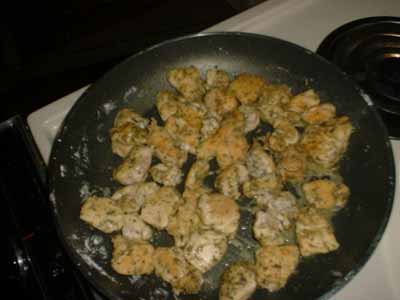 Chicken browning in skillet